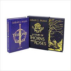 the three books are opened to show them in different colors and designs, one is purple