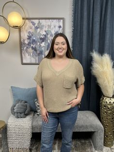 The Going Through It Top by Bibi will be your new favorite sweater top! It features a V-neckline, one chest pocket, low gauge knit, and a hi-low straight hemline. This Top will pair perfect with your favorite white denim for spring! Fabric: 75% Acrylic, 25% Polyester Measurements: Bust (Size M): 26"Length (Size M): Front 25", Back 27" Missy Fit S 0/6-8 M 6-10 L 10-16 XL/1XL 14-18 Relaxed Fit V-neck Sweater With Pockets, Trendy Knit Tops With Pockets, Trendy V-neck Top With Pockets, Casual V-neck Sweater With Pockets, Casual Knit Tops With Pockets, Going Through It, Denim Jacket Short, Denim Joggers, Spring Fabric