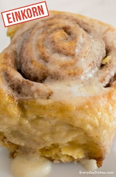 a close up of a pastry on a plate with the word enkorn above it