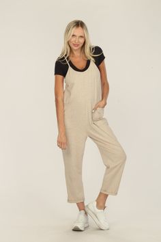 Effortlessly blend style and comfort in our Green Cotton Onsie with a front patch pocket and cami design, creating a versatile wardrobe staple. Material & Care Details 95% Cotton / 5% Spandex Designed in Los Angeles Beige Linen Casual Jumpsuits And Rompers, Comfortable Solid Jumpsuits And Rompers With Pockets, Casual Fitted Jumpsuits And Rompers With Side Pockets, Relaxed Fit Casual Overalls For Loungewear, Casual Relaxed Fit Overalls For Loungewear, Casual Beige Cotton Overalls, Relaxed Fit Overalls With Pockets For Loungewear, Casual Linen Bib Front Overalls, Everyday Summer Overall Jumpsuits And Rompers