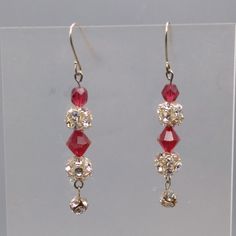 "Red Crystal Ball Dangle Earrings,Vintage Disco Vibe with Clear Prong Set Rhinestones and Bright Faceted Beads Drop 2-1/4\" x 1/2\" Condition * Excellent condition. Gently worn with minimal wear. Size: Womens OS Condition: Pre-Owned Good" Red Sparkling Crystal Jewelry, Faceted Crystal Drop Earrings For Wedding, Wedding Crystal Dangle Earrings With Faceted Beads, Red Crystal Dangle Earrings, Festive Jeweled Crystal Earrings, Wedding Crystal Earrings With Faceted Beads, Vintage Disco, Red Crystals, Accessories Jewelry Earrings