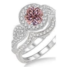 a pink diamond and white gold ring set