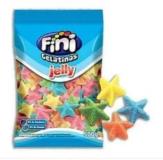 the bag of jelly stars is next to it's packaging