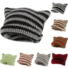 four different color striped knitted pillows on white background