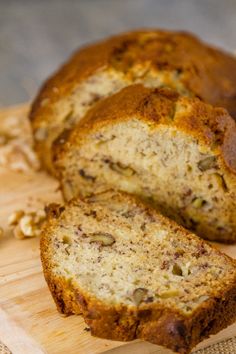 a loaf of banana nut bread on a cutting board