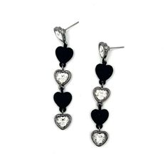 These Mixed Velvet and Glass Hearts Linear Drop Earrings are a unique addition to any jewelry collection. The velvet flocked hearts and bezel set glass stone heart mix add a touch of texture and sparkle, making these earrings stand out. Perfect for adding a playful and stylish touch to any outfit! Zinc alloy with hematite plating for settings and velvet flocking coating on solid hearts. Glass stones. Store away from direct sunlight and water. Do not wear in the water. Earrings Stand, Glam Earrings, Glass Hearts, Smart Glass, Earring Stand, Versatile Jewelry, Forever Jewelry, The Velvet, Glass Heart