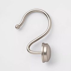 an image of a metal hook on a white background