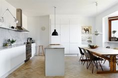 the kitchen is clean and ready to be used for dinner or breakfast time, with modern appliances