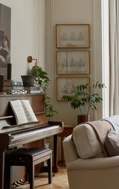 a living room filled with furniture and a piano