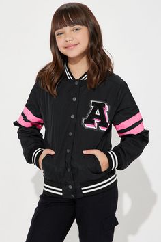 Available In Neon Pink And Black. Varsity Jacket Solid Pockets Button/Snap Front Disclaimer: Due To The Printing Process A Difference In Saturation May Occur. Each Garment Is Unique. 100% Nylon Imported | Mini A Lister Varsity Jacket in Black size 5/6 by Fashion Nova Black Buttoned Outerwear For College, Black Varsity Jacket With Buttons, Fall Black Varsity Jacket With Snap Buttons, Trendy Outerwear With Buttons For College, Spring Varsity Outerwear For School, Varsity Outerwear For School In Spring, Varsity Style Spring Outerwear For School, Black Long Sleeve Varsity Jacket For School, Trendy School Outerwear For Fall