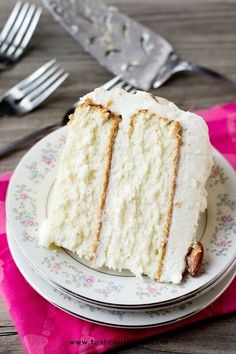 a piece of cake sitting on top of a plate next to a fork and knife