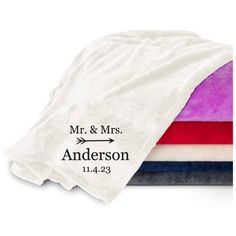 two personalized towels with the names and date on them, one is for mr and mrs