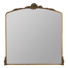 an ornate gold framed mirror against a white background