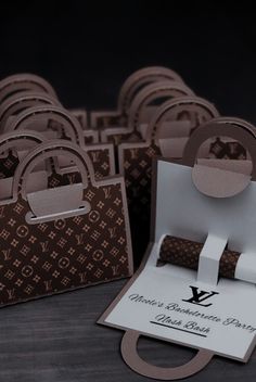 a bunch of brown paper bags sitting on top of a table