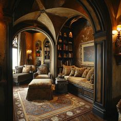 a living room filled with lots of furniture and bookshelves next to a doorway