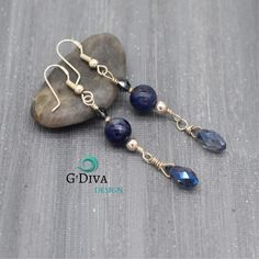 This beautiful and elegant earrings are created expertly by hand and inspired by the swirling colors of the ocean with natural dark blue gemstone sodalite, sparkling briolette and bicone crystals, made with sterling silver wire wrapped. Long and delicate briolette dangle earrings was designed to give you a sophisticated feminine look. These blue bead bohemian earrings is great for weddings or any special occasion. Perfect for a something blue gift ( Weddings) Total long each earring: 2.5" inches Elegant Sodalite Gemstone Jewelry, Blue Sterling Silver Earrings With Gemstone Beads, Blue Gemstone Beads Drop Earrings, Blue Gemstone Bead Drop Earrings, Elegant Lapis Lazuli Wire Wrapped Earrings, Elegant Wire Wrapped Lapis Lazuli Earrings, Blue Gemstone Beads Earrings For Gift, Earring Long, Blue Gemstone Earrings