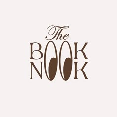 the book nook logo is shown in brown on a white background with black lettering