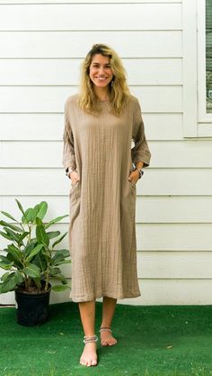 "* Bohemian Style Dress  * One Size Fits Most (US Women's S-3XL) * Organic Double Gauzed Cotton * 2 Side Pockets * Bust up to 50\" * Length 48\" * Coconut Button Back Closure * Suitable for any occasion * Great gift for yourself or your loved ones" Beige Relaxed Fit Cotton Maxi Dress, Casual Long-sleeved Cotton Gauze Dress, Casual Cotton Gauze Long Sleeve Dress, Casual Long Sleeve Cotton Gauze Dress, Bohemian Linen Dress With Relaxed Fit For Daywear, Bohemian Linen Loungewear Dresses, Bohemian Long Sleeve Dress In Natural Fiber, Flowy Cotton Lagenlook Dress, Relaxed Fit Tunic Dress With Natural Dye