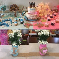 two vases filled with flowers sitting on top of a table