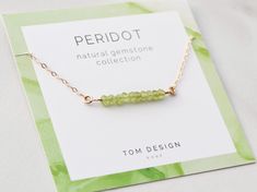 "Peridot Bar Necklace / Dainty Gemstone Necklace / Gemstone Bar Necklace / Birthstone Necklace / August Birthday / Gift for Her / Peridot Our new Gemstone Necklaces are made from natural gemstone beads, with sterling silver, gold filled, or rose gold filled components. Stones are ethically sourced from around the world - we've found the best stones out there! Necklaces are packaged with our custom gemstone cards, then placed into our Tom Design logo stamped gift boxes. Perfect for gift giving! T Signature Necklace Handwriting, Handwriting Necklace Custom, Dainty Gemstone Necklace, Gemstone Bar Necklace, Handwriting Necklace, Permanent Jewelry, August Birthday, Necklace Birthstone, Gemstone Necklaces