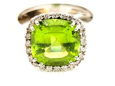 18K White Gold Peridot & Diamond Ring size 7 Perfect gift for your loved one Total diamond 0.45 CT Ring length approximately; 26.5 mm Ring width approximately; 23.4 mm Item weigh 9.11 g Ring size 7 Item will be placed into a gift box Classic Peridot Diamond Ring, Classic Peridot Diamond Ring For Gift, Luxury Green Peridot Diamond Ring, Luxury Multi-stone Peridot Ring, Lime Green Peridot Rings Fine Jewelry, Pink Sapphire Diamond Ring, Sapphire Diamond Ring, Sapphire Earrings, Ring Size 7