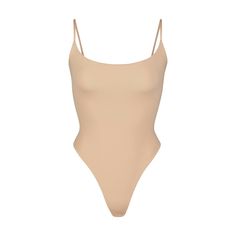 This Cami Bodysuit features a wide scoop neckline and low back providing the perfect foundation under clothing. This piece includes a thong back for sea... Under Clothing, High Neck Bodysuit, Cami Bodysuit, Perfect Foundation, Size 16 Dresses, Body Shapers, High Cut, Low Back, Shapewear