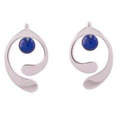 Shining elegant forms are crafted in sterling silver to drop below the ears caressing round stones of dyed blue lapis lazuli. Working with his wife to realize his own designs Peru's Tiberio Gonzales presents these fantastic drop earrings. Blue Polished Drop Earrings, Silver Sterling Teardrop Earrings With Polished Finish, Blue Drop Earrings With Polished Finish, Silver Sterling Silver Teardrop Earrings, Elegant Sterling Silver Nickel-free Teardrop Earrings, Elegant Sterling Silver Teardrop Earrings With Polished Finish, Elegant Nickel-free Sterling Silver Teardrop Earrings, Blue Sterling Silver Earrings With Polished Finish, Nickel-free Sterling Silver Elegant Earrings