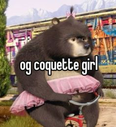 a bear riding a bike with the caption og coquette girl