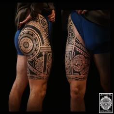 two men's legs with tattoos on them, both showing their butts and thighs