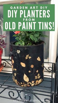 an old planter is painted black and gold with the words garden art diy painters from old paint tins