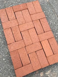 a red brick laying on the ground