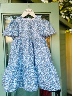 Hand made bespoke floral tiered dress for 3-4 years , perfect for spring/summer.  Liberty print cotton lawn fabric with satin polyester lining. Cute Tiered Dress For Garden Party, Cute Cotton Tiered Dress, Blue Tiered Ruffle Dress For Spring, Blue Tiered Floral Print Dress, Cute Cotton Dress With Tiered Skirt, Cotton Tiered Ruffle Dress For Garden Party, Spring Blue Tiered Dress, Blue Tiered Dress For Spring, Spring Blue Tiered Dress With Tiered Skirt