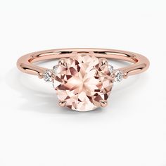 an oval morganite and diamond ring in 18k rose gold