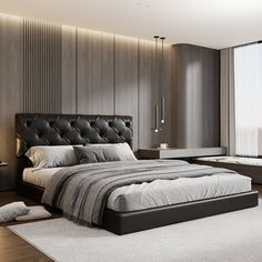 a bedroom with a large bed in the middle and a window to the side that looks out over the city