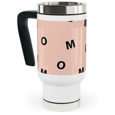 a pink and black coffee mug with the word mom printed on it's side