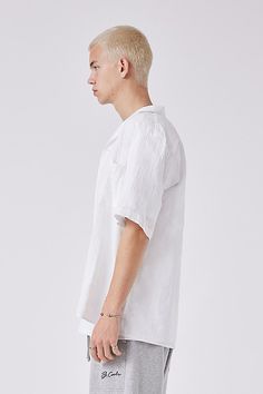 Spice up your sun-drenched staples with the Barney Cools Resort Shirt in White Seersucker. u00a0Featuring a relaxed fit, resort-collar neckline and shell look buttons. This summer-ready shirt is constructed from lightweight 100% Cotton. Content + Care u00a0100% Cotton u00a0Cold machine wash u00a0Imported Size + Fit u00a0Measurements taken from size L Length 30.8" u00a0Sleeve 10.3" u00a0Hem 22.2" | Barney Cools Textured Seersucker Resort Shirt Top in White, Men's at Urban Outfitters Summer Vacation Shirt With Pockets, Summer Beach Shirt With Pockets, Summer Beach Short Sleeve Shirt With Pockets, White Summer Shirt With Pockets, Summer Linen Short Sleeve Shirt, Beach Shirt With Relaxed Fit And Camp Collar, White Beach Shirt With Pockets, Summer Beach Camp Shirt With Pockets, Summer Camp Shirt With Pockets For Beach