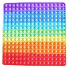 an image of a rainbow colored mat with circles on the top and bottom, all in different colors