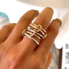 We Customized this ring for a client, now you are welcome to buy it too! Custom connected ring Round, Heavy Fit, Mother's Day Gift 14ga round gold filled 1.6mm 10ga gold filled round band 2.6mm 12ga 925 ss round band2.0mm 12ga gold filled half round band 2mm 10ga 925 ss round 2.6mm With four gold filled connected rings Please Note: Our gold filled rings may have a visible solder mark and it may be brighter than the ring as we use 14k gold for soldering. This is not a Quality Issue but limitation and nature of materials & process we use to make handmade jewelry. We gently polish our jewelry so that the 14k gold layer stays intact and the jewelry lasts longer. We are very sorry, we will NOT be able to accept any returns in this regard. Thank you for your understanding and supporting our smal Modern Gold Rings Nickel Free, Unique Gold Stackable Rings For Everyday, Adjustable Rose Gold Ring With Polished Finish, Gold Sterling Silver Round Midi Rings, Hypoallergenic Yellow Gold Sterling Silver Stackable Rings, Gold Sterling Silver Stackable Rings With Open Band, Nickel-free Yellow Gold Rings For Anniversary, Silver 14k Gold Stackable Rings, Gold Sterling Silver Ring With Open Band