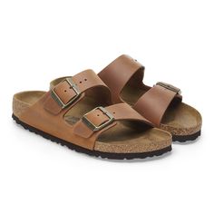 An icon of timeless design and legendary comfort, the Arizona sandal has been defining style since 1973. Oiled leather only looks better with wear, giving each pair a unique, well-traveled patina. With an original contoured footbed for support, it'll feel uniquely yours wherever you take it. Contoured cork-latex footbed creates custom support with wear Oiled leather upper gives each pair a unique finish Suede footbed lining helps keep you comfortable EVA sole is flexible & lightweight Two straps Mens Boots Casual, Swim Pants, Denim Sweater, Zermatt, Shoe Boot Sandals, Eva Sole, Reykjavik, Birkenstock Arizona, Slipper Boots