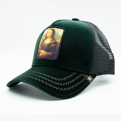 Stand out from the crowd with our Trucker Hat crafted with its bold Mona Lisa graphics and unique shade! Made with the finest velvet materials, breathable mesh paneling, and a cool patch on the front, it's the ultimate attention-grabber for your everyday fits, day and night! Color: Hunter Green Trucker Hat Artistic Snapback Hat, One Size Fits Most, Artistic Snapback Hat One Size Fits Most, Artistic Adjustable Baseball Cap, Green Trucker Hat, Attention Grabber, Everyday Fits, Women Trucker, Attention Grabbers, Cool Patches