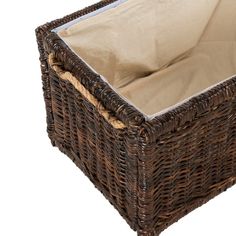 a brown wicker basket with a tan lining