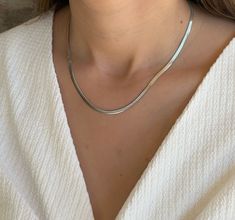 Elevate your style with our Thick Silver Snake Stainless Steel Herringbone Chain Necklace for Women. This exquisite piece combines bold design with a touch of sophistication, making it a perfect accessory for any occasion. The thick snake chain adds a modern twist to the classic herringbone pattern, creating a unique and eye-catching look. Enjoy free shipping to the US when you spend $35+ Chain Designs Silver Women, Silver Snake Chain Necklace, Silver Herringbone Necklace, Silver Chain For Women Unique, Silver Chain Designs For Women, Necklace Designs Silver, Silver Chains For Women, Silver Chain Women, Thick Silver Necklace