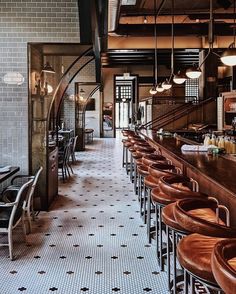 an image of a restaurant setting with bar stools