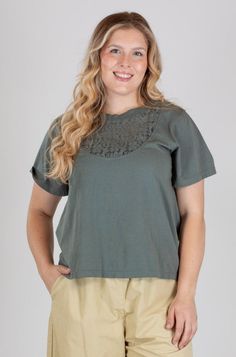 Prairie Underground's Lace Boy Tee is a short sleeved cotton tee with a lace front. Lace inset brings a unique and feminine touch to this piece. Relaxed fit, this tee skims the torso and falls just over the tops of hips. Wear over a cami for coverage. A unique twist on the classic tee! Made in Seattle, WAFabric: 100% CottonCare: Machine Wash Cold Gentle, Line Dry or Tumble Dry LowSize Medium (M): Bust 41", Hips 43", Length 24" Spring T-shirt With Lace Trim And Crew Neck, Spring Crew Neck T-shirt With Lace Top, Casual Cotton T-shirt With Lace Trim, Summer Cotton Lace Top With Short Sleeves, Cotton Lace Top With Short Sleeves For Summer, Casual Cotton Top With Lace Collar, Casual T-shirt With Lace Trim For Spring, Crew Neck Cotton Top With Lace Trim, Cotton Crew Neck Top With Lace Trim