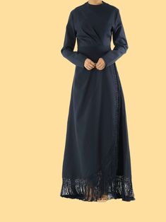 Add a little fun to your next night out with our Navy Fringe queen maxi dress. This sleek design will make you want to dance all night. Overlapping skirt features a ruched detail at the side, falling to an overlapping, tulip-style. The fabric in this dress is made from high quality polyester, unlined, perfect for cool nights. 58inch hand-wash polyester Draped Maxi Dress With Side Slits For Spring, Long Sleeve Maxi Dress With Side Slits For Evening, Ruched Maxi Dress For Evening, Ruched Evening Maxi Dress, Gala Draped Maxi Dress With Side Slits, Long Sleeve Ruched Maxi Dress For Gala, Party Maxi Dress With Side Slits And Draped Style, Gala Maxi Dress With Side Slits And Draped Style, Ruched Backless Maxi Dress For Night Out