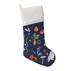 a christmas stocking with an image of animals and plants on it's side