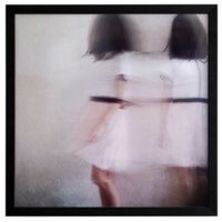 a blurry photo of a woman in a white dress