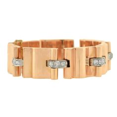 Glamour and luxury jewelry began in Hollywood during the 1940's and 1950's with the be-jeweled glamour gals. This fabulous retro bracelet is a fine example from that era (ca1940). An absolutely stunning piece, the bracelet is made of 14kt rose gold and comprised of 7 heavy scrolled links. With an unusual and striking design, the links have a curled shape and 3-dimensional look. Connecting each gold link is a platinum topped connector which is detailed with 3 old Mine Cut diamonds. The diamonds h Glamour Gals, Retro Bracelet, Gold Link Bracelet, Antique Bracelets, Gold Link, Retro Jewelry, Diamonds And Gold, 14kt Gold, Estate Jewelry