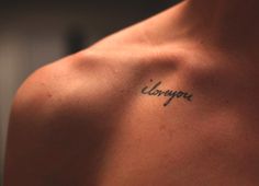 the back of a man's shoulder with an inscription on it that says conjupt