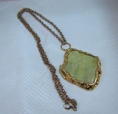 "Handcrafted Dansk Smykkekunst Denmark yellow aventurine pendant/necklace Set in a gold plated setting. Many of her pieces are done in sterling, this one is not marked. The setting (excluding the loop) is 2-5/8\" long and 2-1/4\" long The chain measures 29\" long" Gold Cabochon Pendant Necklace, Gold Pendant Necklace With Cabochon, Spiritual Gold Cabochon Necklace, Gold Spiritual Necklace With Cabochon, Spiritual Gold Necklace With Cabochon, Gold Necklaces With Cabochon For Collectors, White Gemstone Necklace, Yellow Aventurine, Winter Necklace